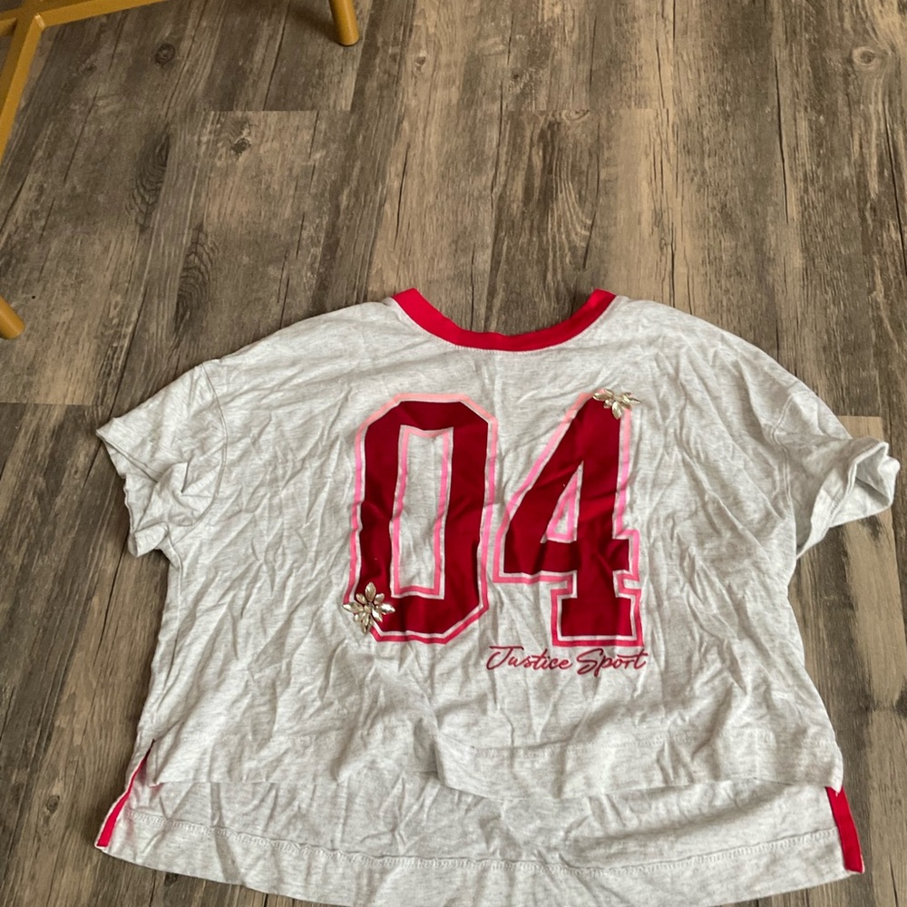 M girl, pink red and white shirt, justice